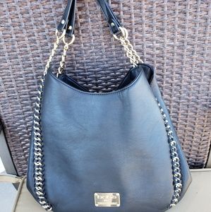Black BeBe purse with gold chain accent